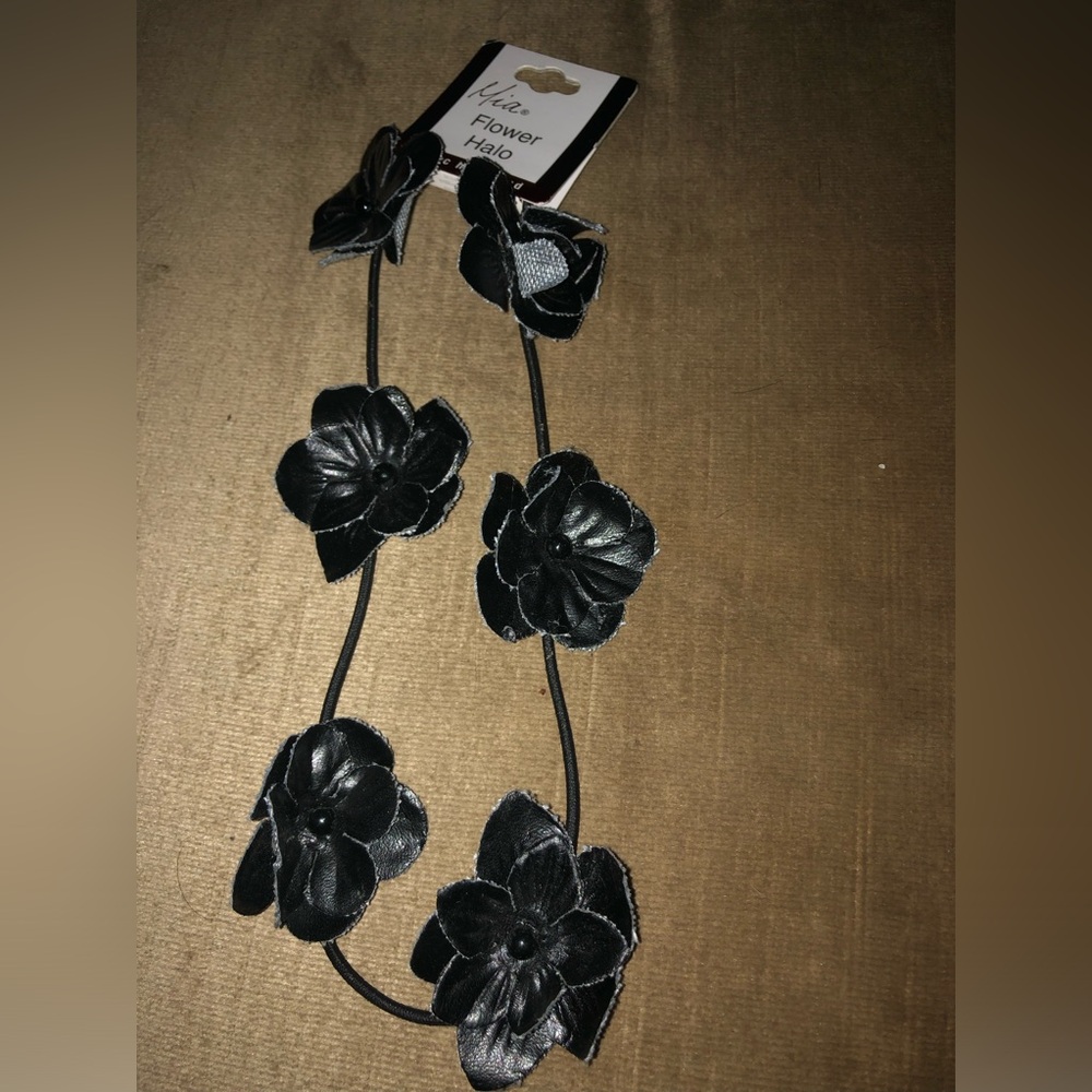 Mia Flower Halo Faux Leather Headband- 846 $12 or 🎉